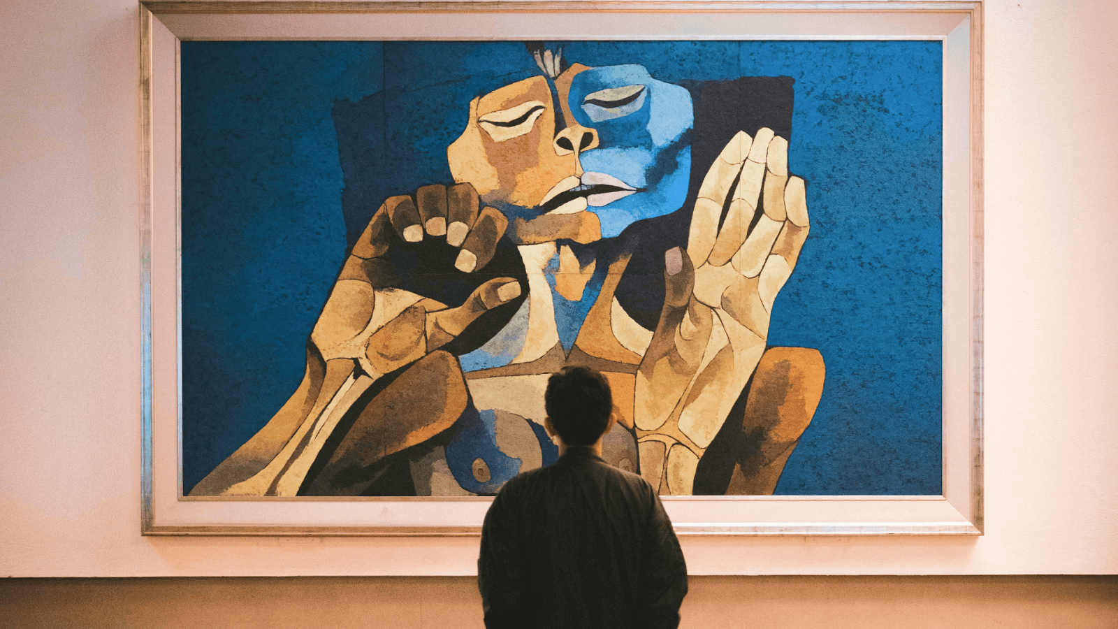 Art Licensing - Man Standing by Painting at Art Gallery - Esteban Santiago Gonzalez
