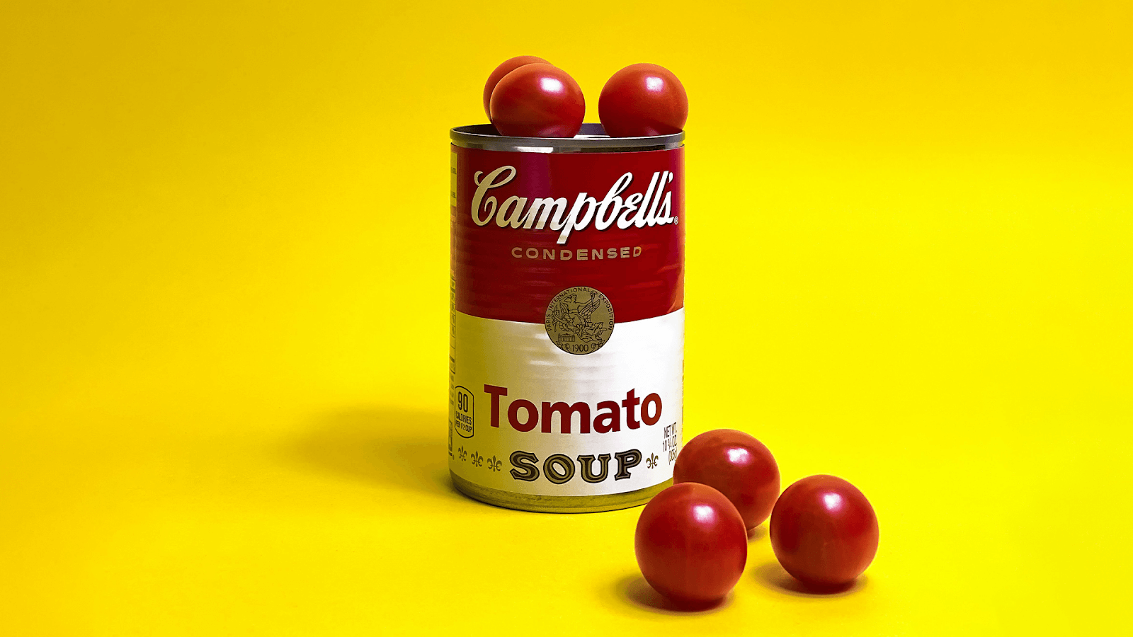 Campbell's tomato soup on a yellow background - Anastasiya Badun